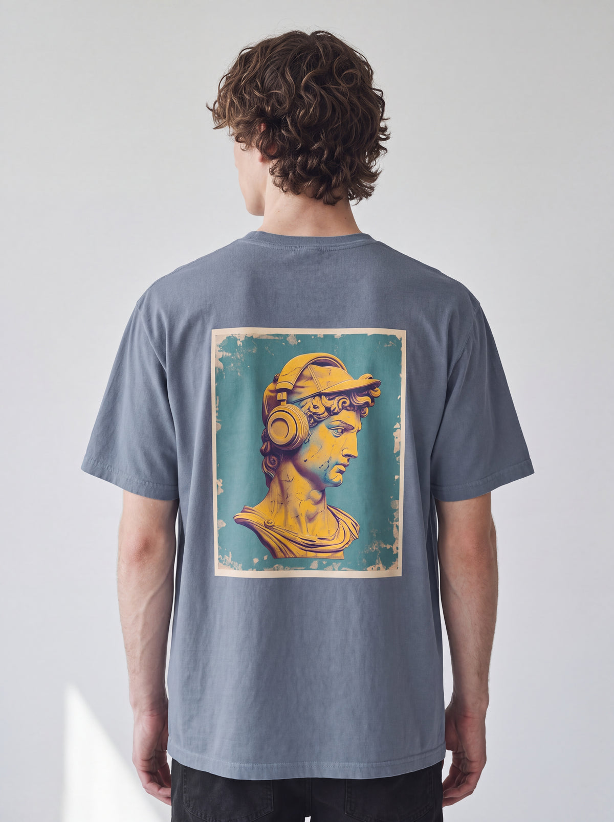 Unisex Heavyweight 6.1 oz Cotton Boxy Fit T-Shirt featuring classical statue with headphones Graphic - Editorial Dual Male Model Lookbook Front and Back View