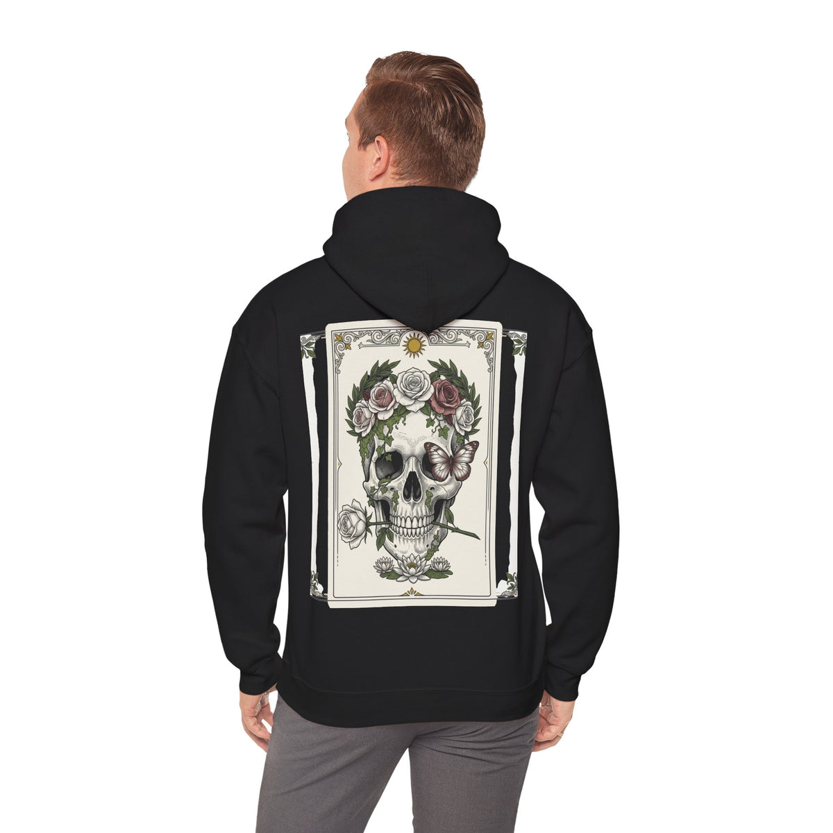 Floral skull framed by roses printed on the back of a heavyweight cotton-blend hoodie