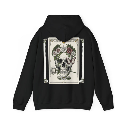 Floral skull framed by roses printed on the back of a heavyweight cotton-blend hoodie