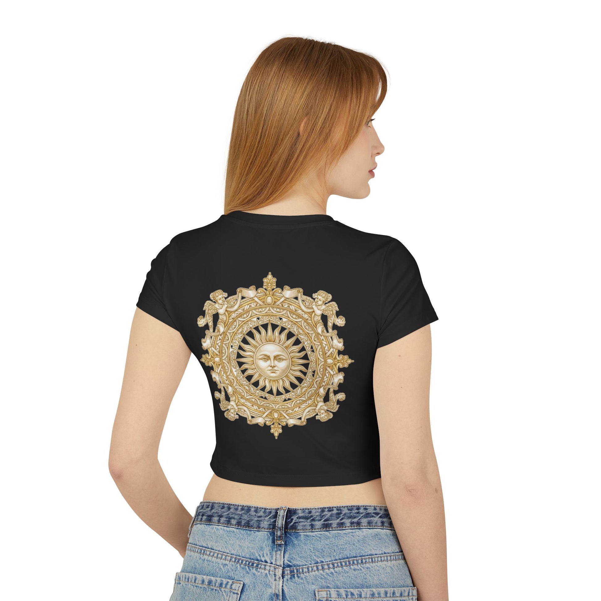 Gold sun medallion printed on the back of a cropped organic cotton baby tee