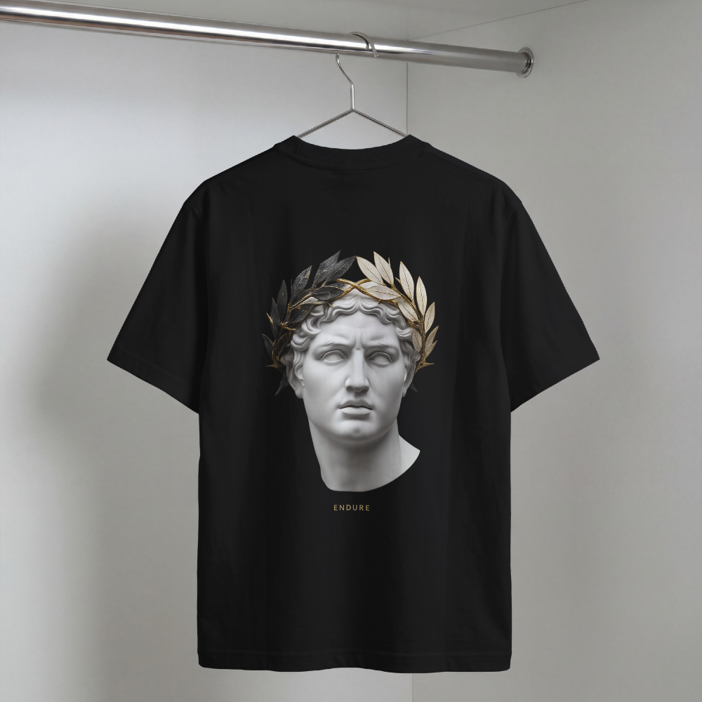Classical marble bust crowned with laurel printed on the back of a garment-dyed heavyweight cotton tee