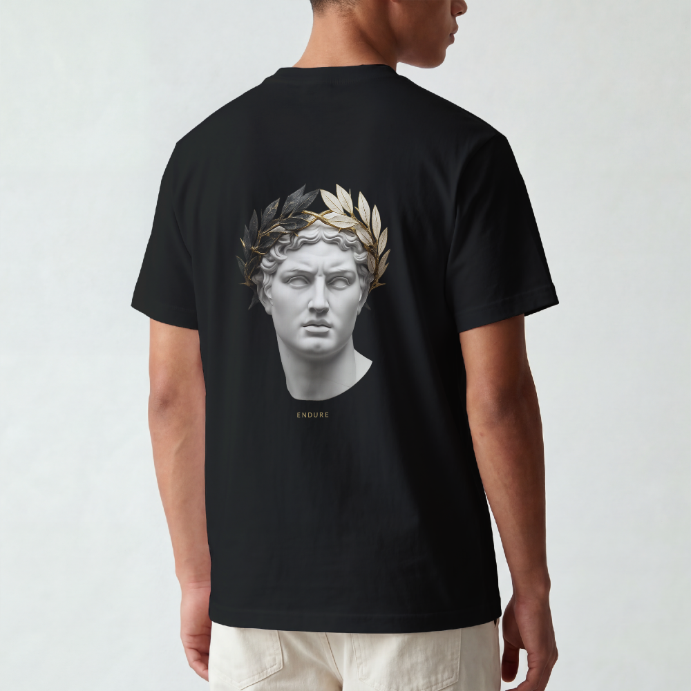 Classical marble bust crowned with laurel printed on the back of a garment-dyed heavyweight cotton tee