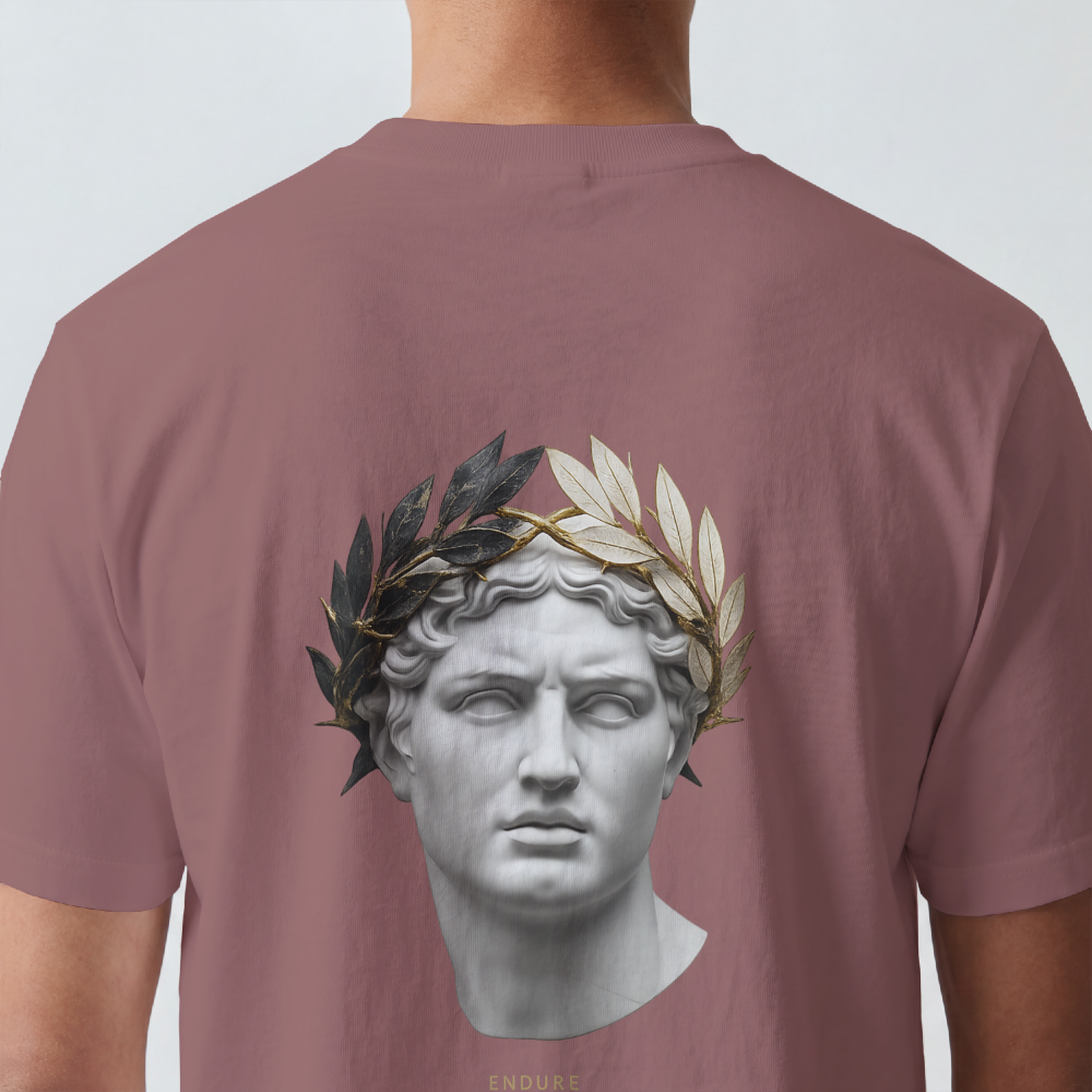 Classical marble bust crowned with laurel printed on the back of a garment-dyed heavyweight cotton tee