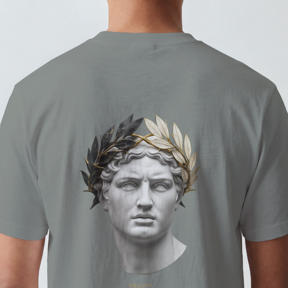 Classical marble bust crowned with laurel printed on the back of a garment-dyed heavyweight cotton tee