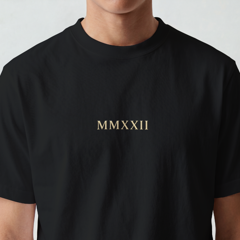 Atlas rendered in sepia with celestial scrollwork on the back of a garment-dyed heavyweight cotton tee