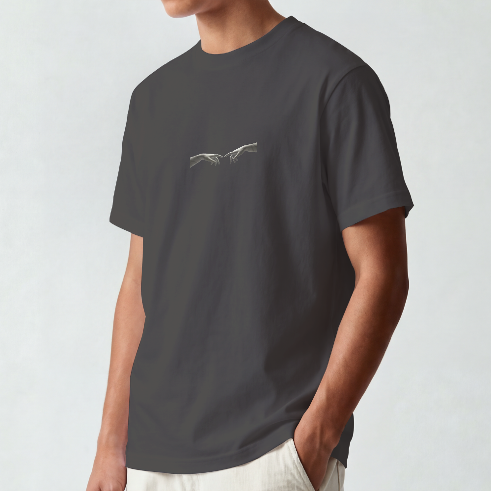 Classical bust struck by a single red brushstroke on the back of a garment-dyed cotton tee