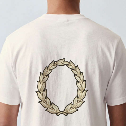 Hand-drawn gold laurel wreath printed on the back of a garment-dyed heavyweight cotton tee