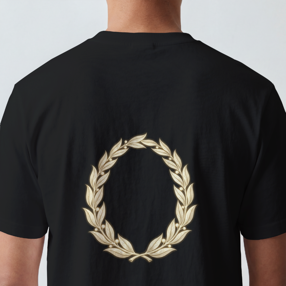 Hand-drawn gold laurel wreath printed on the back of a garment-dyed heavyweight cotton tee