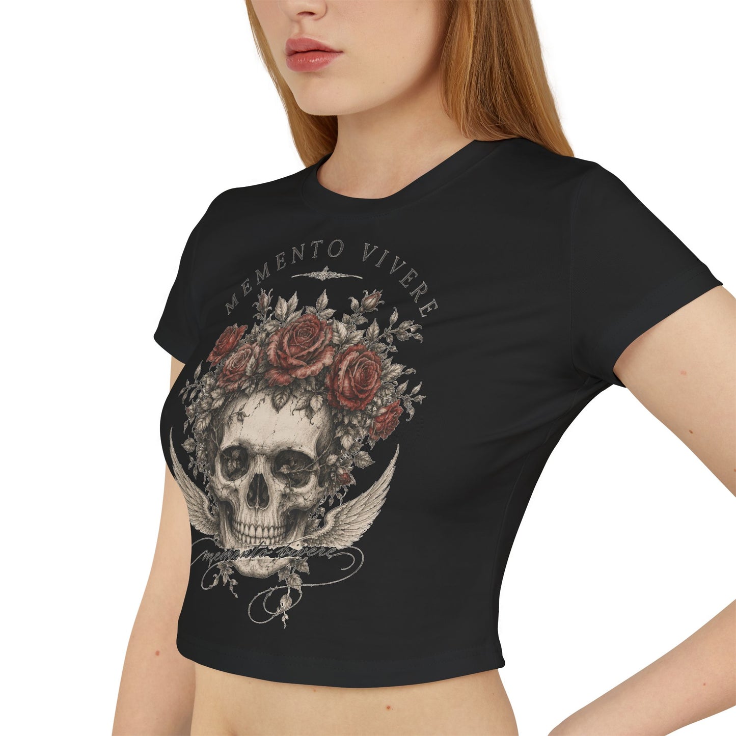 Distressed skull crowned with red roses on a cropped organic cotton baby tee