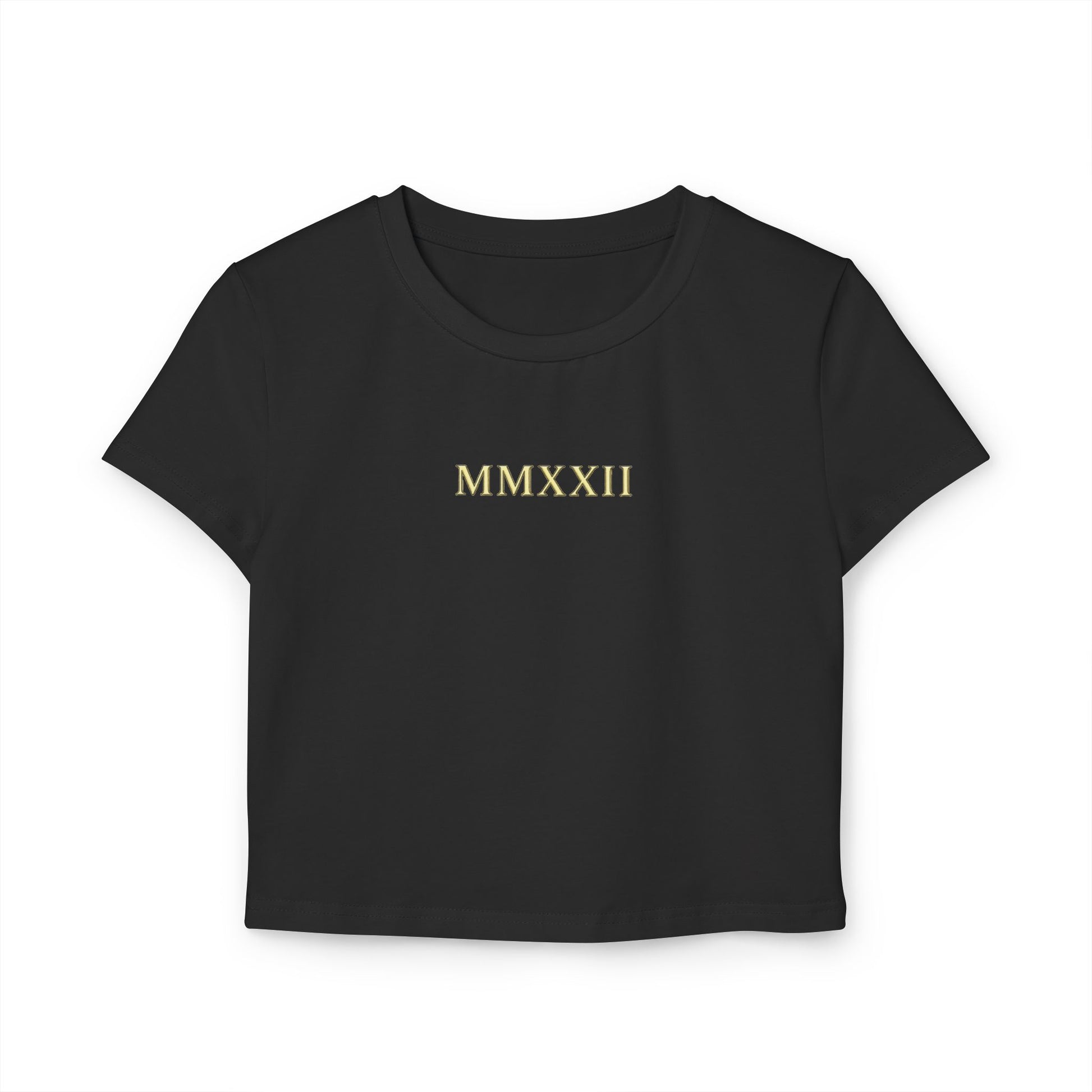 Gold sun medallion printed on the back of a cropped organic cotton baby tee
