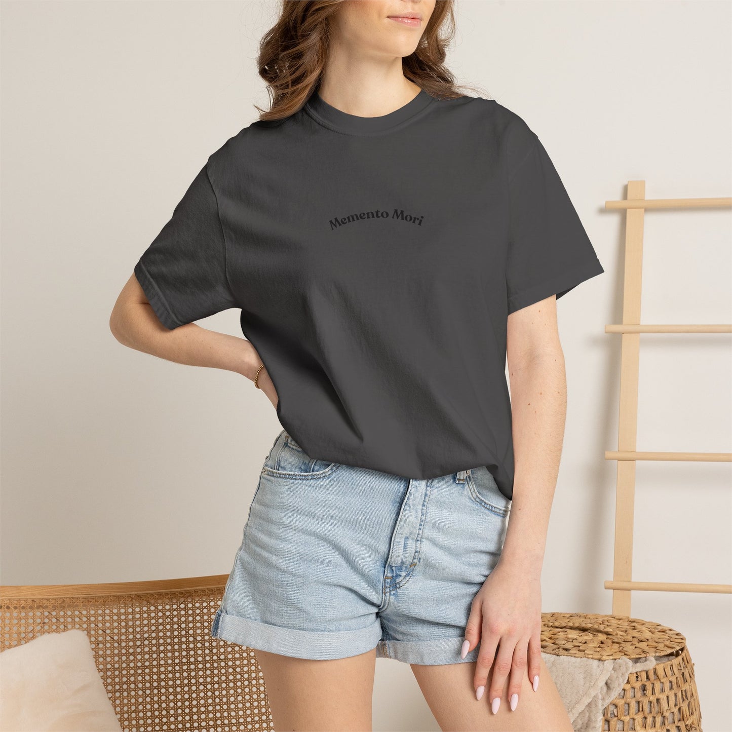 Skull crowned with roses printed on the back of a garment-dyed heavyweight cotton tee