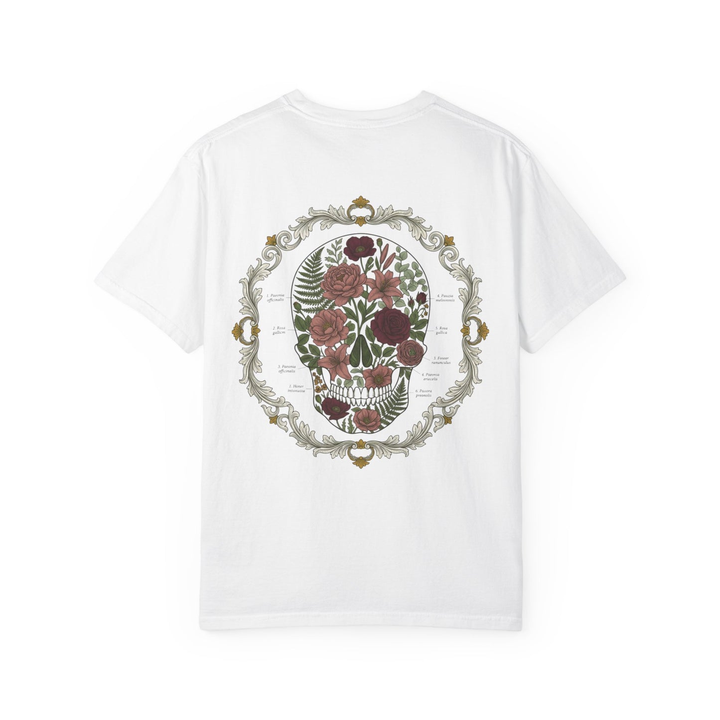 Floral skull framed in botanical scrollwork printed on the back of a garment-dyed cotton tee