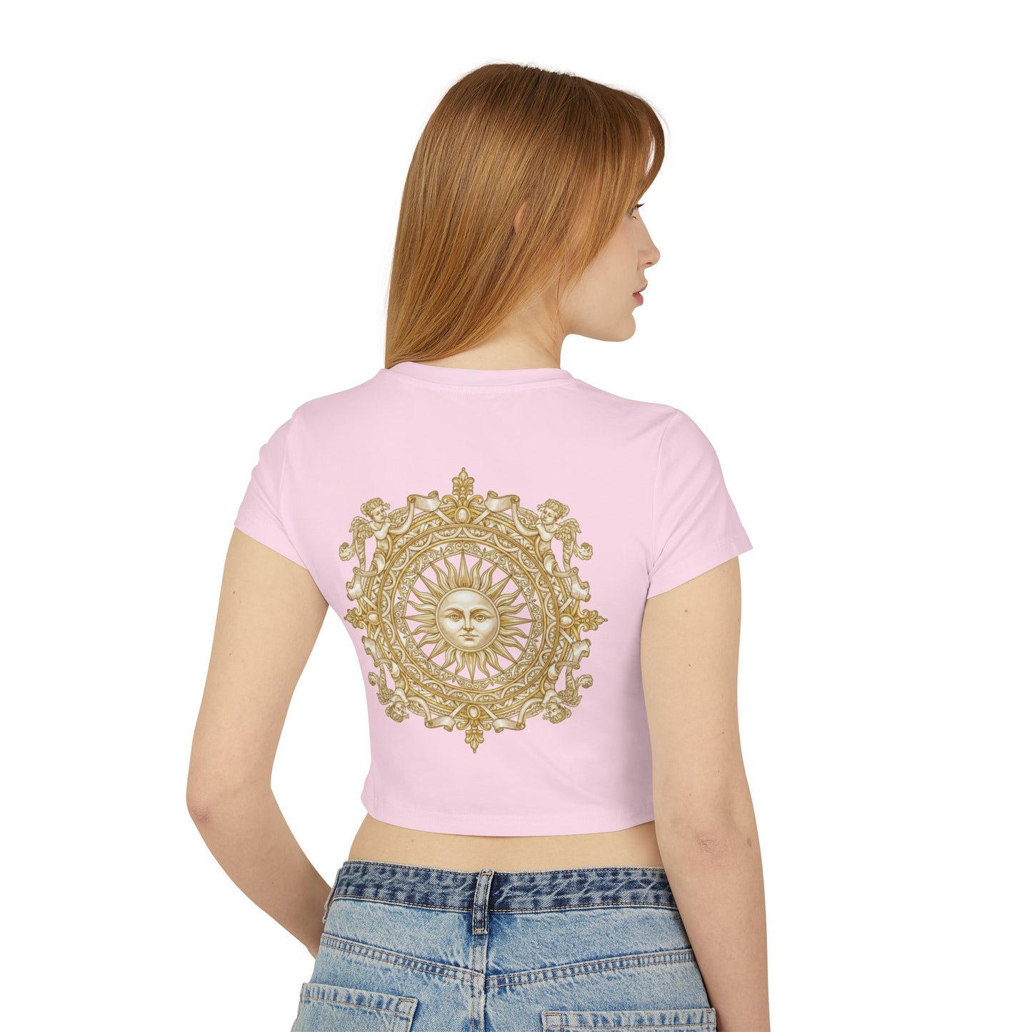 Gold sun medallion printed on the back of a cropped organic cotton baby tee