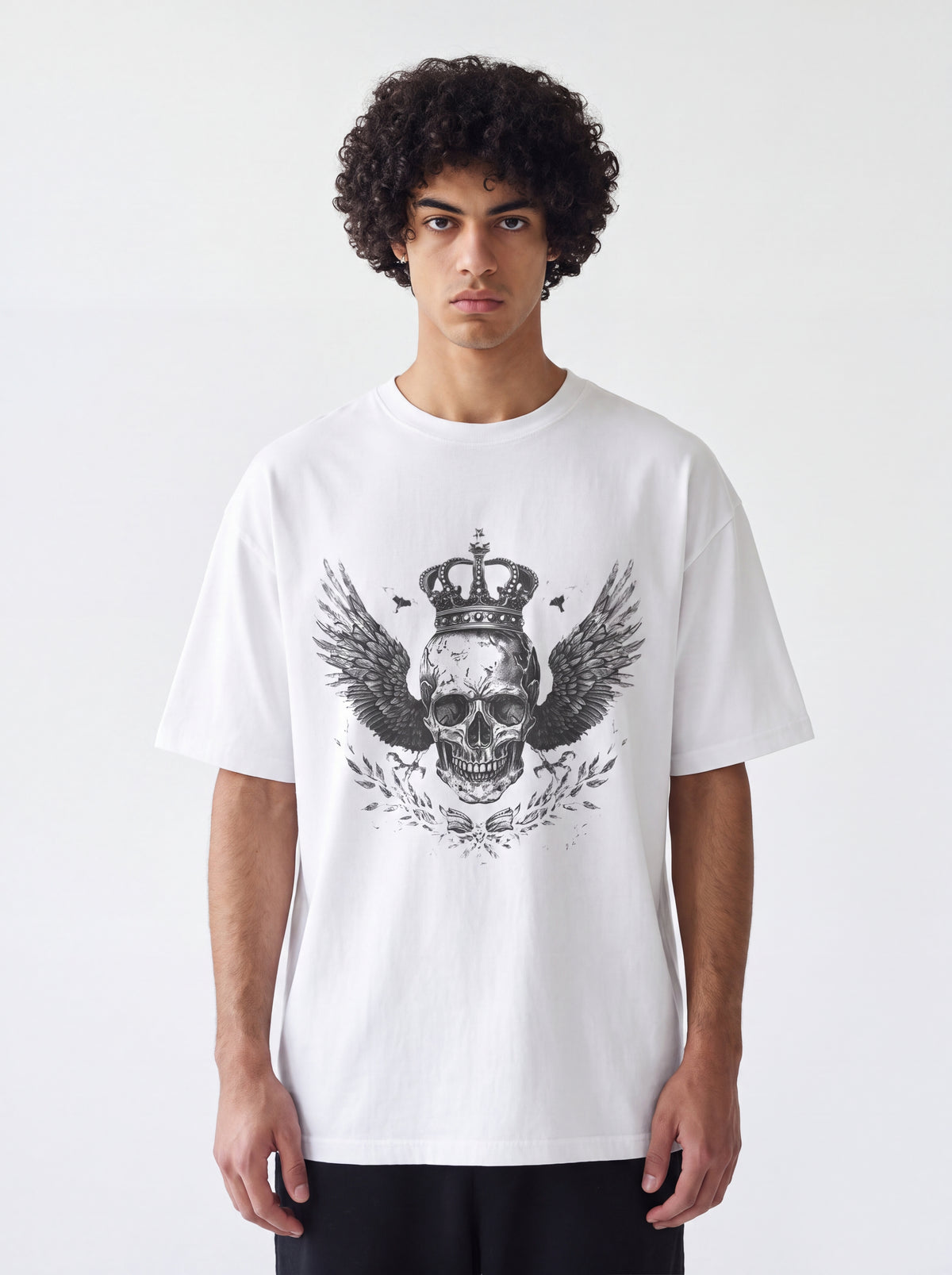 Unisex Heavyweight 6.1 oz Cotton Boxy Fit T-Shirt featuring crowned winged skull Graphic - Editorial Dual Male Model Lookbook Front and Back View